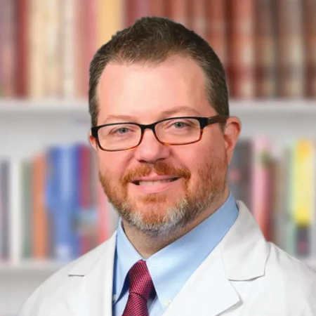 Spec. dr med. Andrew Fishman, Specijalista ORL i neurohirurgije